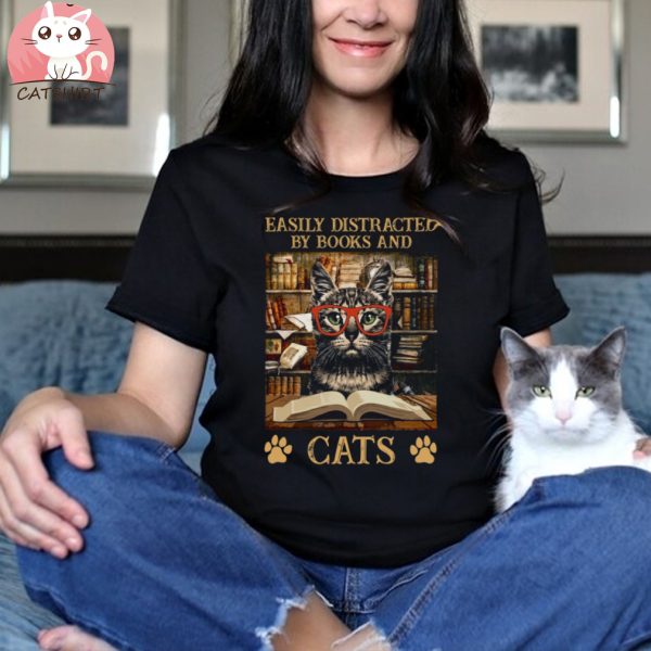 Easily Distracted By Books And Cats easily distracted by cats and books a daisy Essential T Shirt