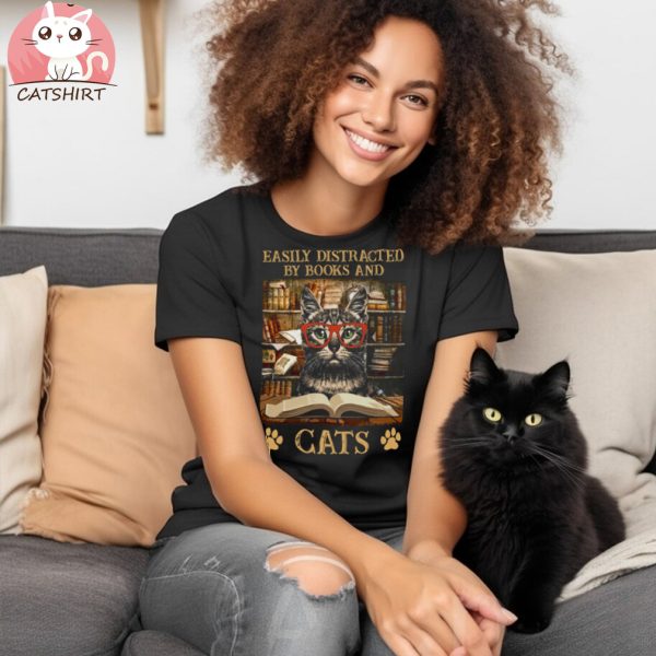 Easily Distracted By Books And Cats easily distracted by cats and books a daisy Essential T Shirt