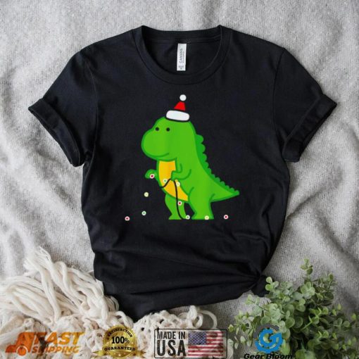 Dinosaur putting up string lights Christmas shirt