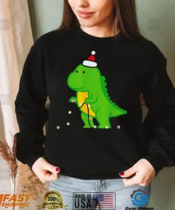 Dinosaur putting up string lights Christmas shirt