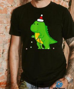 Dinosaur putting up string lights Christmas shirt