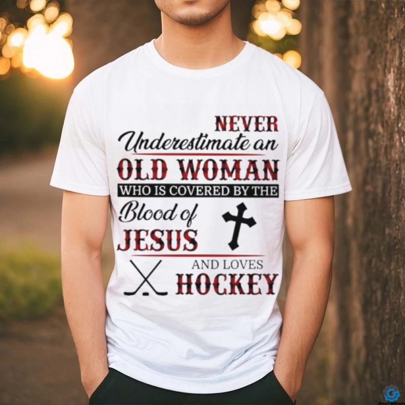 Never underestimate an old woman who is covered by the blood of jesus and loves hockey shirt