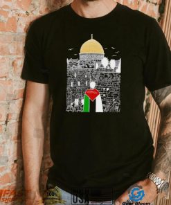 A boy wearing Free Palestine flag shirt