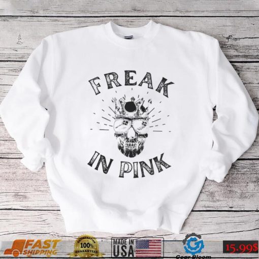 Freak in pink skull shirt