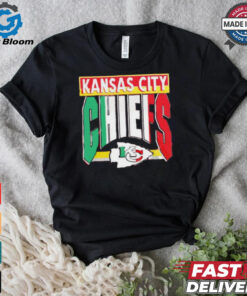 Taylor wearing Kansas City Chiefs Mexican style shirt