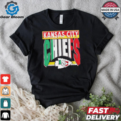 Taylor wearing Kansas City Chiefs Mexican style shirt