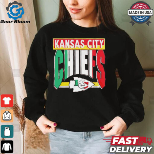 Taylor wearing Kansas City Chiefs Mexican style shirt