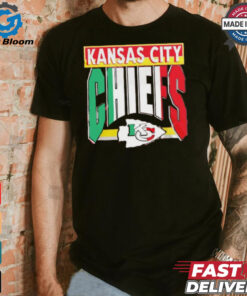 Taylor wearing Kansas City Chiefs Mexican style shirt