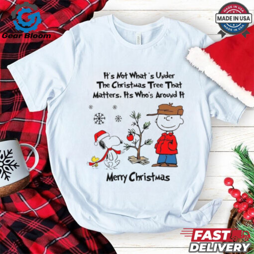 Official Snoopy Charlie Brown And Woodstock It’s Not What’s Under The Tree That Matters It’s What’s Around It Merry Christmas 2024 Shirt