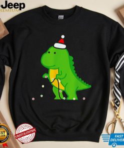 Dinosaur putting up string lights Christmas shirt
