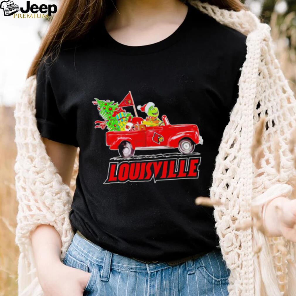 https://img.eyestees.com/teejeep/2023/Happy-Merry-Christmas-The-Grinch-drive-a-car-Louisville-Cardinals-football-logo-flag-gift-shirt2.jpg