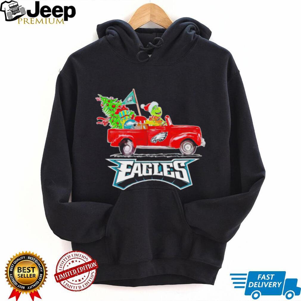 https://img.eyestees.com/teejeep/2023/Happy-Merry-Christmas-The-Grinch-drive-a-car-Philadelphia-Eagles-football-logo-flag-gift-shirt3.jpg