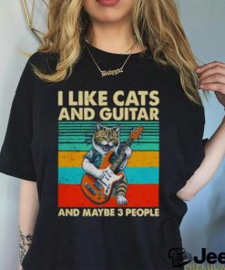 I like cats and guitar and maybe 3 people vintage shirt