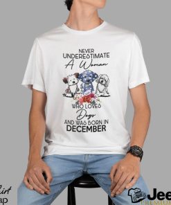 Never Underestimate a woman who loves dogs and was born in december shirt