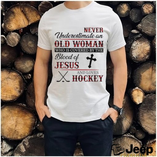 Never underestimate an old woman who is covered by the blood of jesus and loves hockey shirt