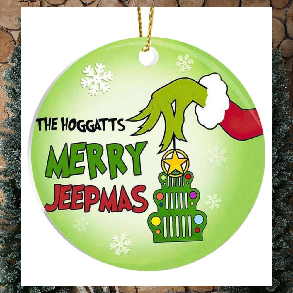 GRINCH STYLE HAND WITH XMAS BAUBLE AND TEXT MERRY CHRISTMAS