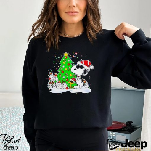 Snoopy and snowman next to the pine tree Christmas shirt