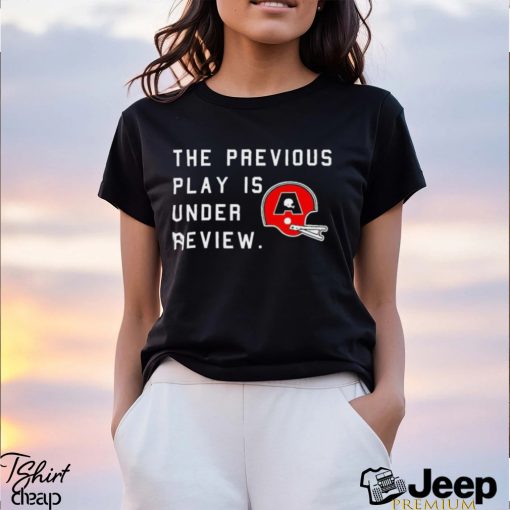 The previous play is under review helmet addict logo shirt