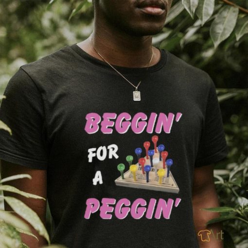 Beggin’ For A Peggin’. Black Shirt