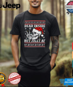 Dead Inside But Jolly AF Skeleton Skull Light Ugly Xmas Christmas T-shirt featuring a humorous design with a skeleton skull, festive lights, and a cheeky message. Perfect for those who want to embrace a dark yet jolly spirit during the holiday season.