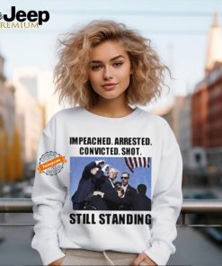 Donald Trump impeached arrested convicted shot still standing shirt