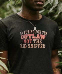 I’m voting for the outlaw not the kid sniffer shirt