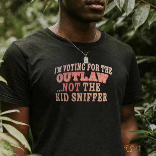 I’m voting for the outlaw not the kid sniffer shirt