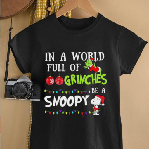 In A World Full Of Grinches Be A Snoopy Christmas 2024 Shirt