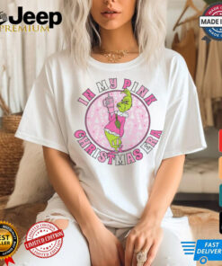Grinch In My Pink Christmas Era shirt featuring a trendy and playful design of the Grinch in a pink holiday theme, perfect for celebrating Christmas in a fun, fashionable way.