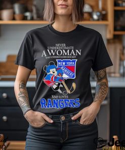 Mickey never underestimate a woman who understands hockey and loves Rangers shirt