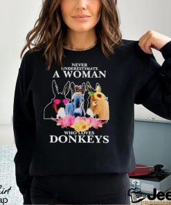 Never underestimate a woman who loves donkeys funny shirt