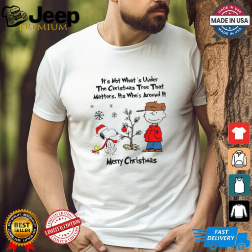 Official Snoopy Charlie Brown And Woodstock It’s Not What’s Under The Tree That Matters It’s What’s Around It Merry Christmas 2024 Shirt