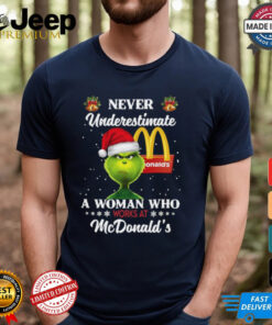 Santa Grinch never underestimate a woman who works at McDonald’s Christmas 2024 Shirt