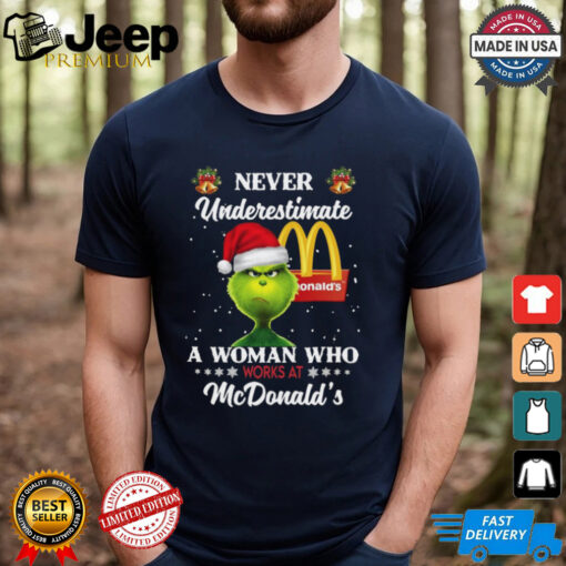 Santa Grinch never underestimate a woman who works at McDonald’s Christmas 2024 Shirt