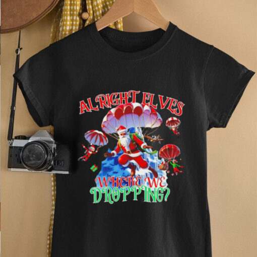 Santa al right elves where we dropping Christmas shirt