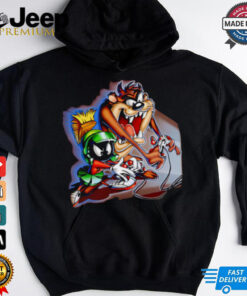Taz Play Video Game with Marvin the Martian shirt featuring a fun and dynamic graphic of Taz from *Looney Tunes* and Marvin the Martian engaging in a video game battle, with vibrant colors and playful, cartoon-style design.